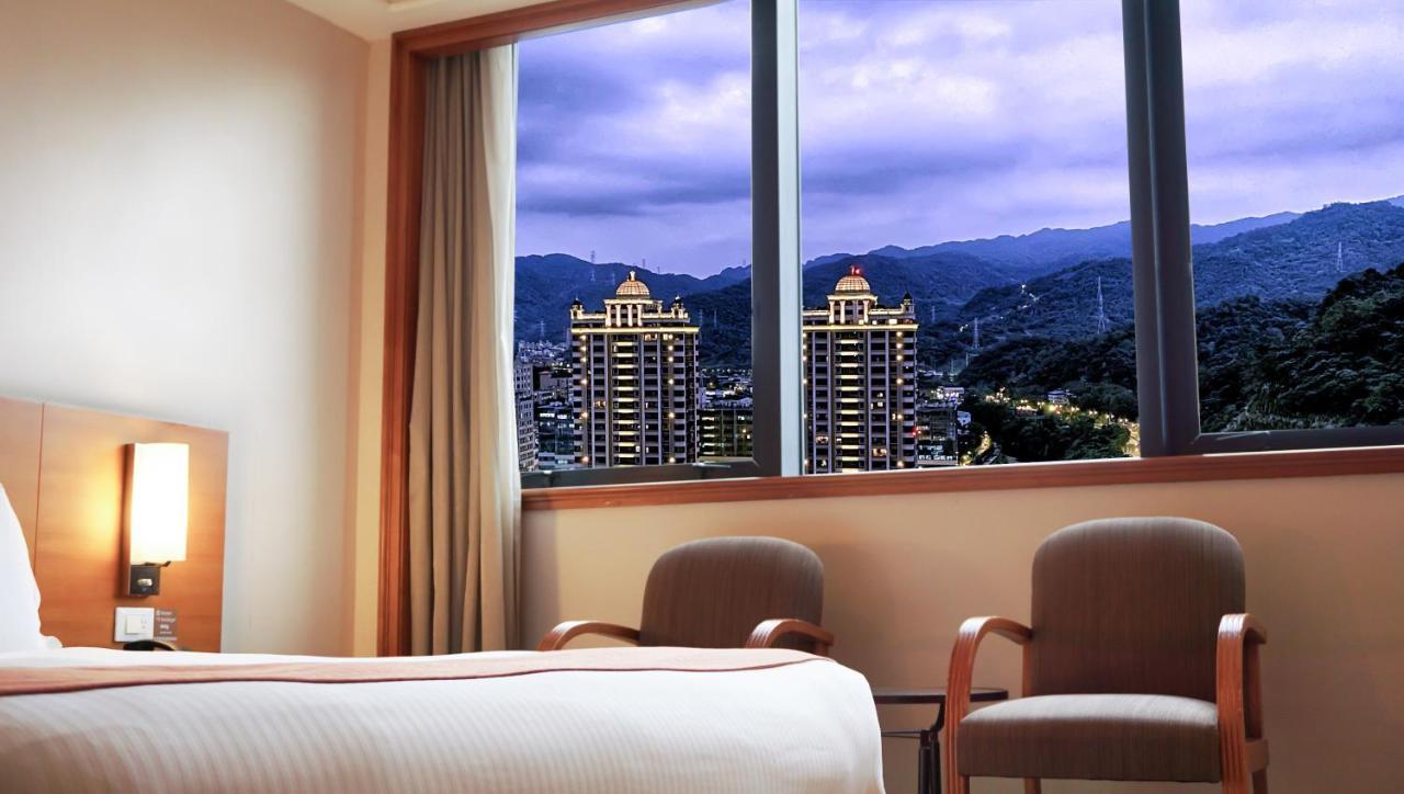 Hione Holiday Hotel Taipeh Zimmer foto